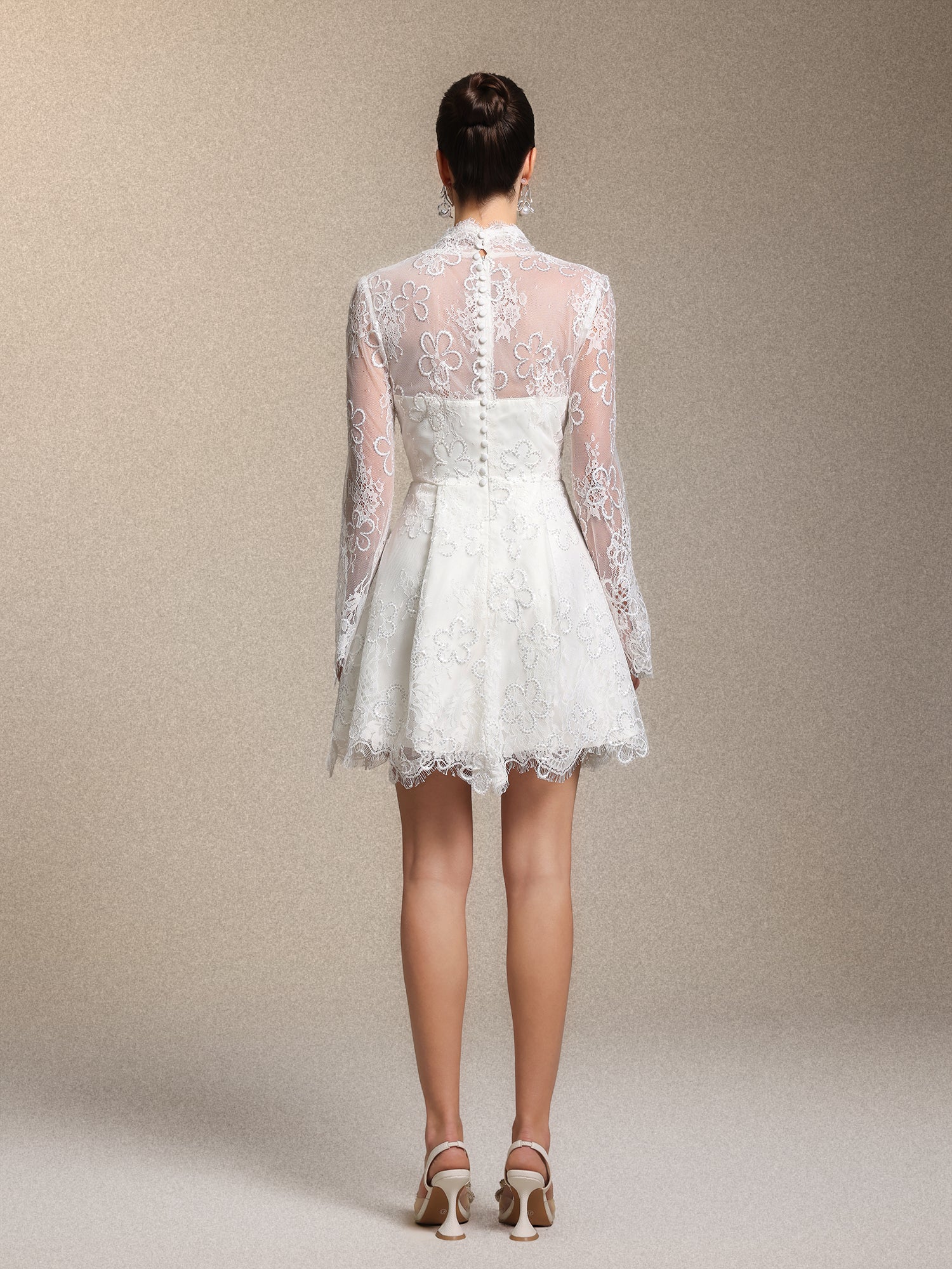 Irare Romantic V Neck Long Sleeve Cinched Waist White Lace Mini Dress