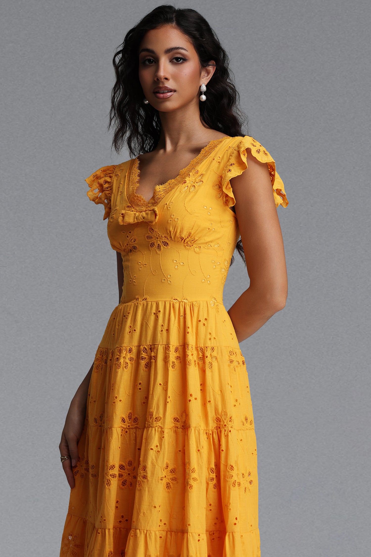 Jerlyn Resort Flowy V Neck Sleeveless Bow Ruffle Woven Maxi Dress